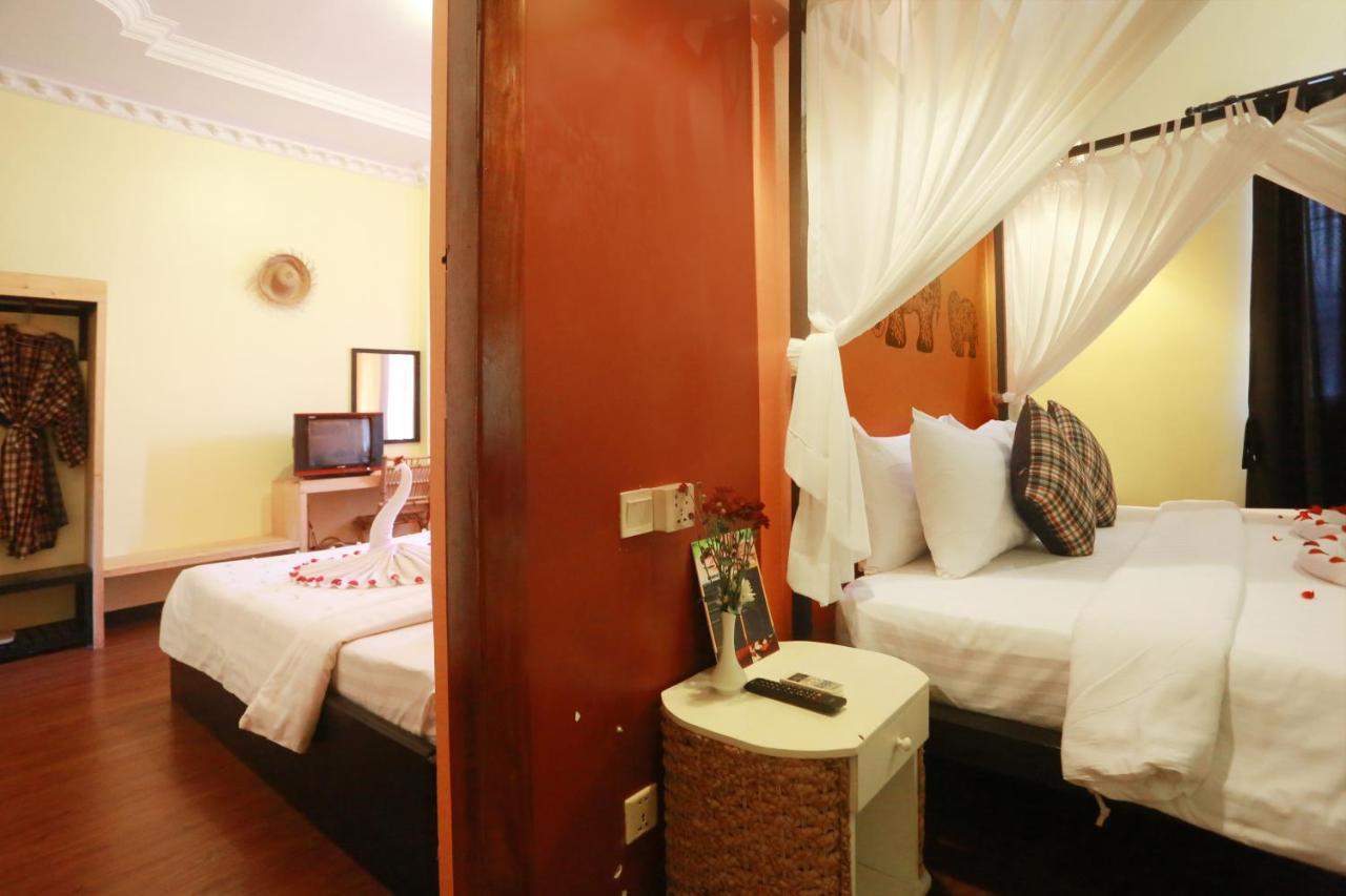 Central Privilege Hotel Ciudad de Siem Riep Habitación foto